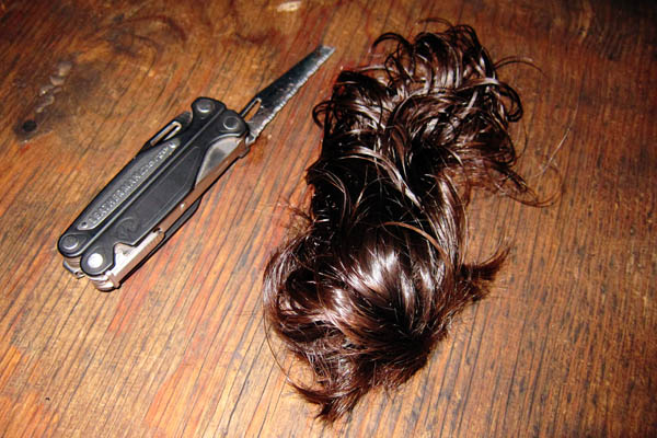 The Leatherman saw used to cut hair